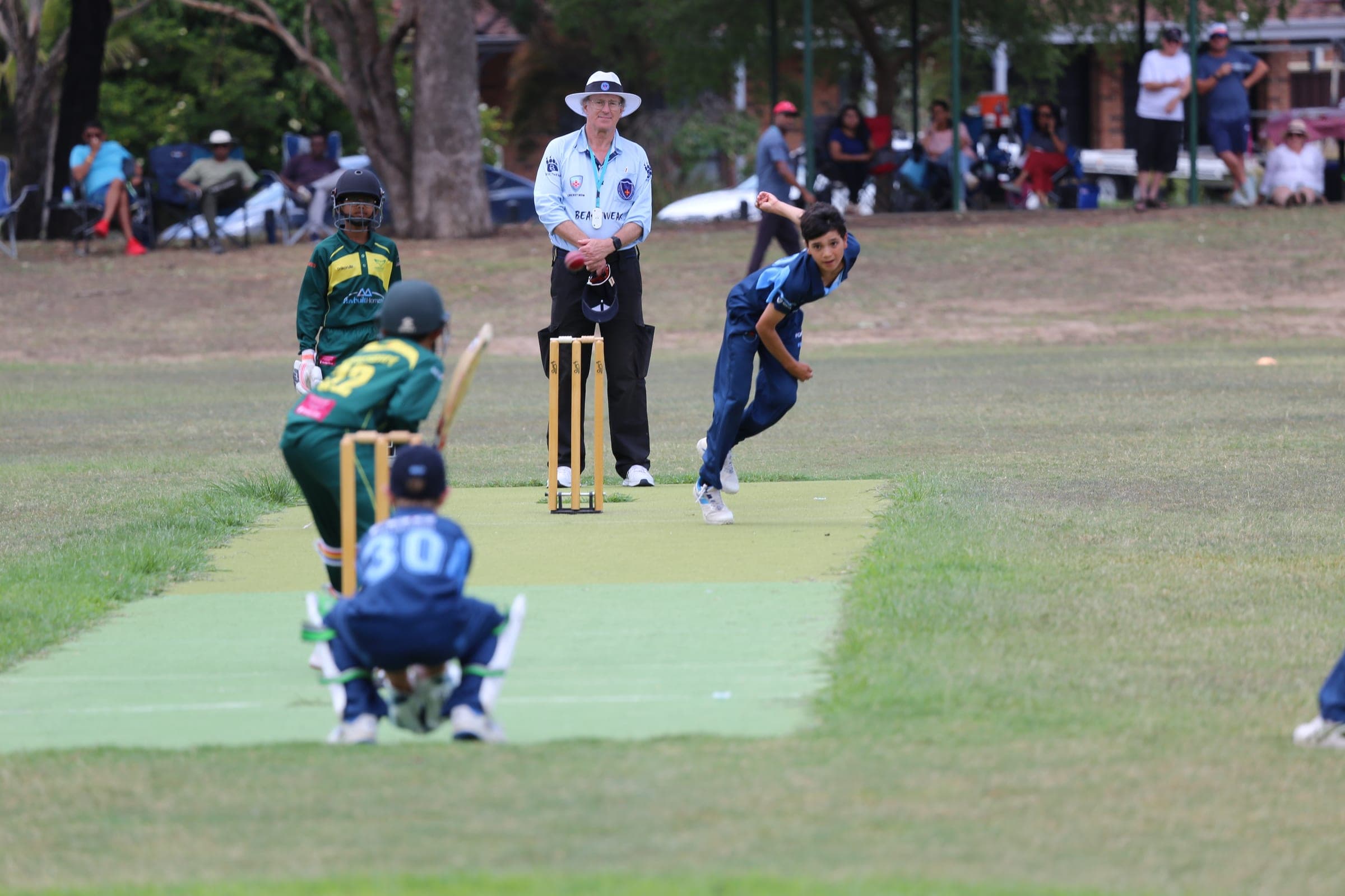 Ethan bowling in a Division 1 junior representative cricket match